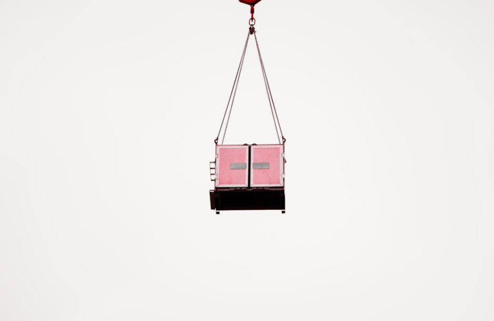 Hoe gebruik je een hijsoog veilig in combinatie met zwaar materieel?